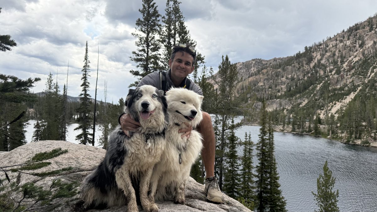 Chris with Zen and Aspen in the mountains